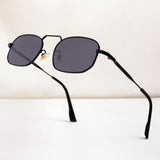 Black sunglasses with dark lenses on a white background