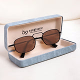 Sunglasses with brown lenses in a blue case on a white background
