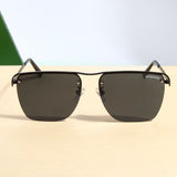 Heldish. Black Square Sunglasses