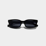Black cat-eye sunglasses with dark lenses, shown from the front on a light gray background.