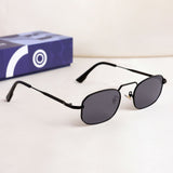 Black sunglasses with a blue box in the background