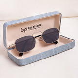 Sunglasses in an open blue Sunglassic case on a light background